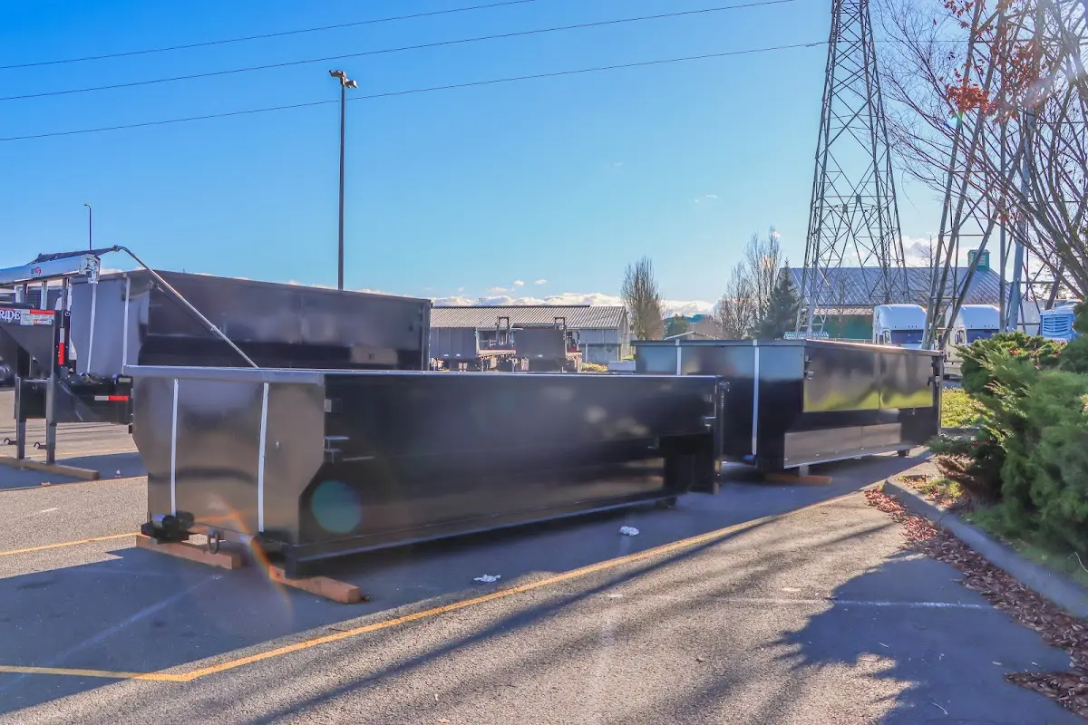 Roll-off dumpster ready for waste disposal at job site for 2 Yard Dumpster Rental in Farmington